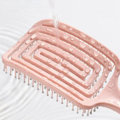 Elastic Hollow-Out Scalp Massage Comb & Styling Brush – Designed to gently stimulate the scalp while effectively detangling hair, this versatile tool speeds up blow drying for a smooth, effortless style.