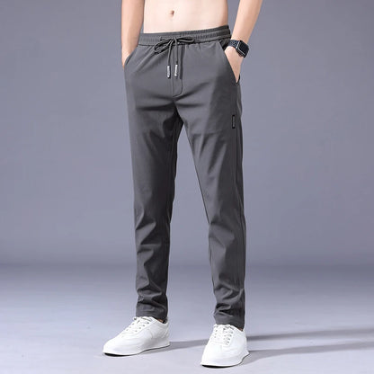Lightweight Summer Men's Casual Trousers – Experience all-day comfort with these thin, soft trousers featuring an elastic, lace-up waist for a customized fit.