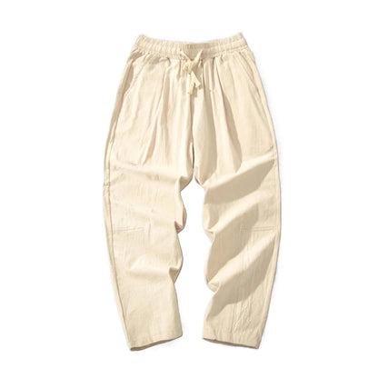 Summer Men's Versatile Cotton Trousers – Enjoy summer comfort with these long pants featuring a drawstring waist and baggy fits for an adaptable, casual look.