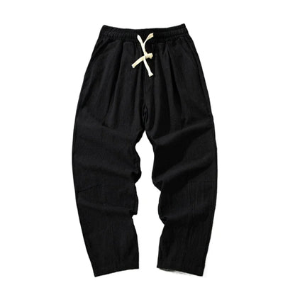 Summer Men's Versatile Cotton Trousers – Enjoy summer comfort with these long pants featuring a drawstring waist and baggy fits for an adaptable, casual look.